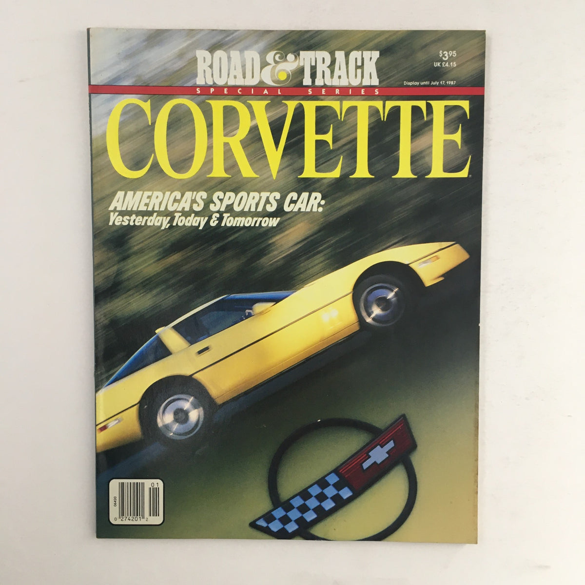 Road & Track Magazine July 1987 featuring Corvette: America's Sport Car cover, showcasing a yellow Corvette in motion with a dynamic background.