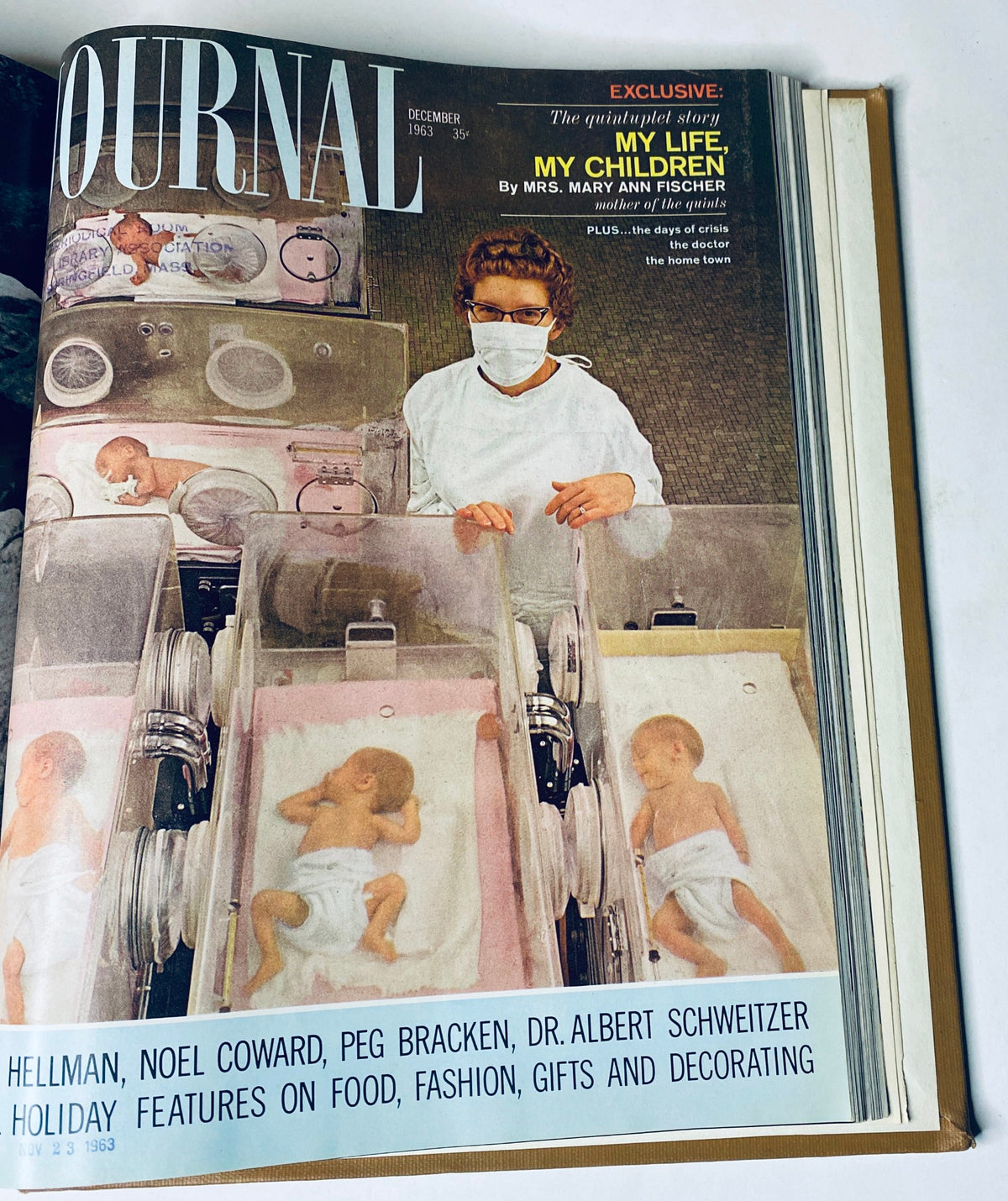 Ladies' Home Journal Library Bound Magazine 1963 Full Year January - December depicting a nurse holding multiple newborns in incubators on the cover of the December 1963 issue.