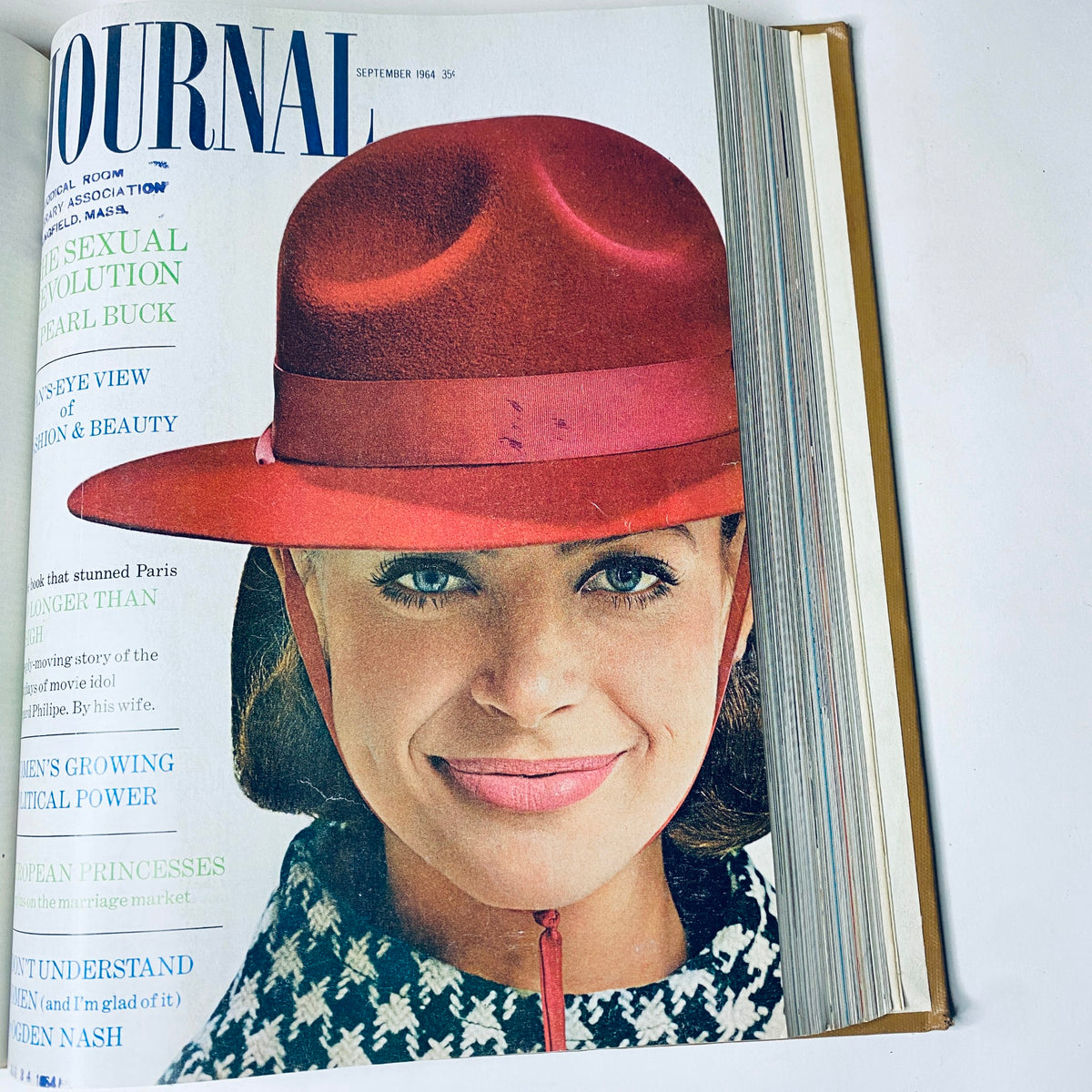 Ladies' Home Journal Bound Magazine 1964 - September issue cover presenting a woman in a red hat, highlighting fashion and beauty topics featured in this edition.