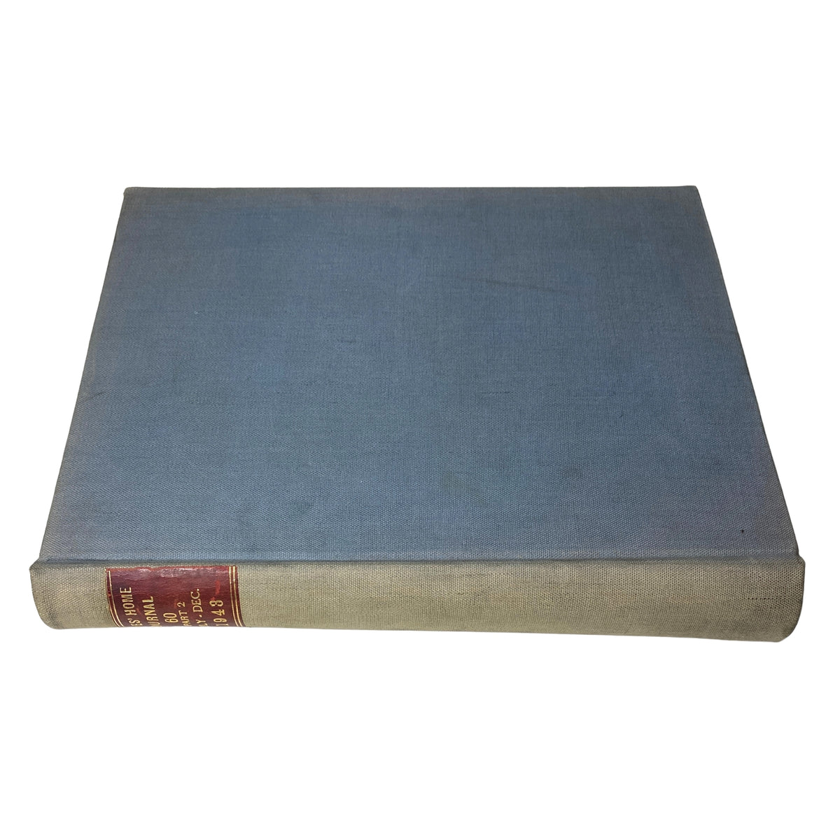 Ladies' Home Journal Library Bound Magazine 1943 Full Year January - December, presented from a top angle displaying the bound volume in a sleek blue finish.