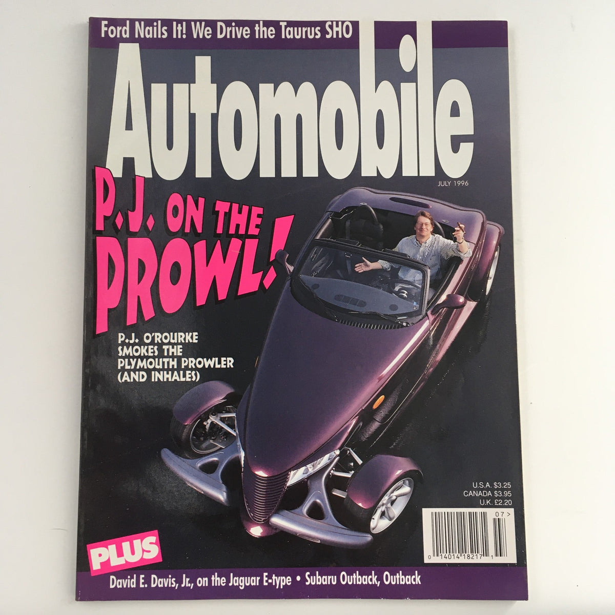 Cover of Automobile Magazine, July 1996 issue featuring an article by David E. Davis Jr. on the Jaguar E-Type. The cover highlights an article titled 'P.J. on the Prowl!' and showcases a unique Plymouth Prowler convertible with a driver. Ideal for vintage car enthusiasts and collectors.