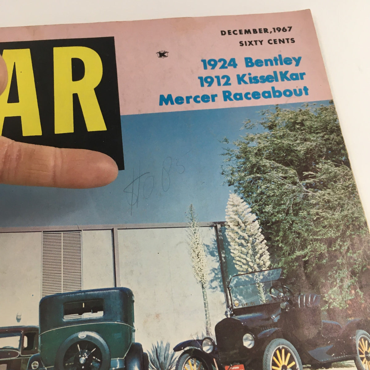 Close-up view of the Car Classics Magazine December 1967 Ford Issue cover showcasing the bold title and details about featured classic cars like the 1924 Bentley and 1912 KisselKar.