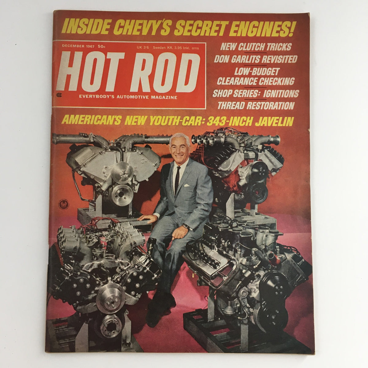 Cover of Hot Rod Magazine, December 1967, featuring the title 'America's New Youth Car: 343 Javelin.' The magazine showcases automotive engines with a smiling man in a suit positioned between them, highlighting the muscle car culture of the 1960s.