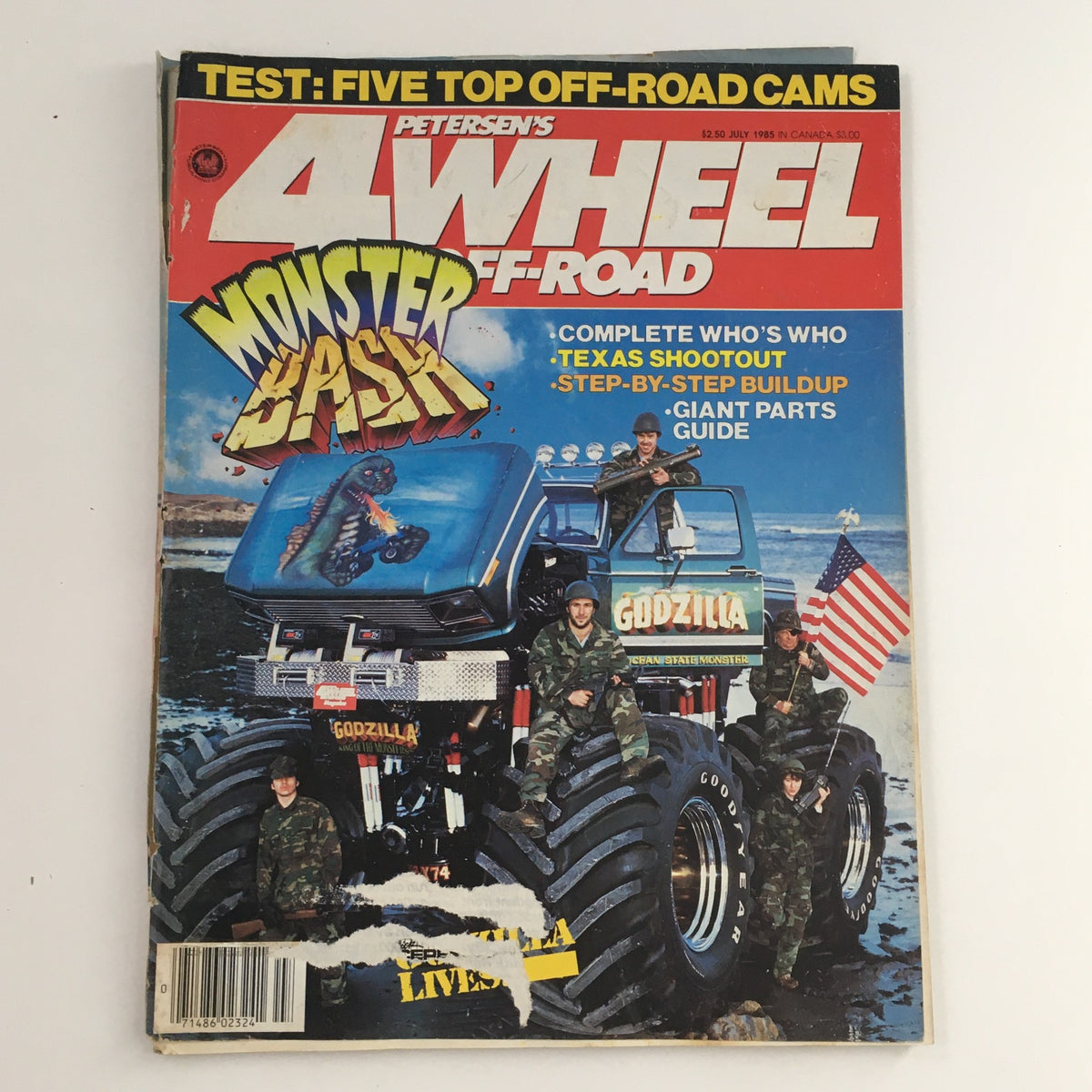 Petersen's 4 Wheel & Off-Road July 1985 magazine cover featuring a giant monster truck named Godzilla and military personnel, showcasing a step-by-step buildup and giant parts guide for off-road enthusiasts.