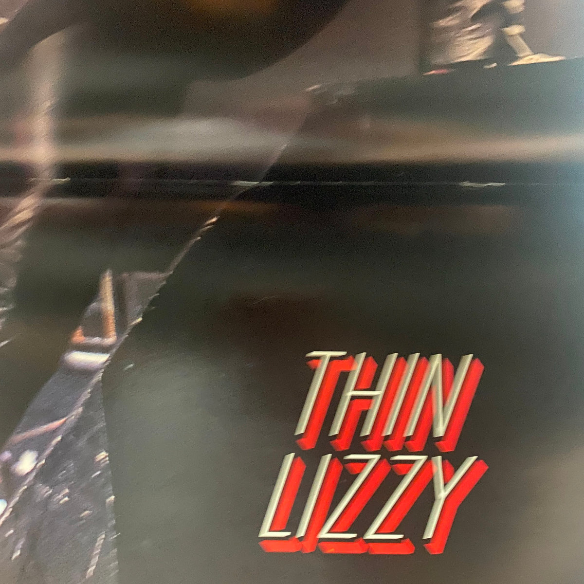 Image of the Thin Lizzy logo from the Guitar for the Practicing Musician Magazine March 1991, representing the iconic band featured in the publication.