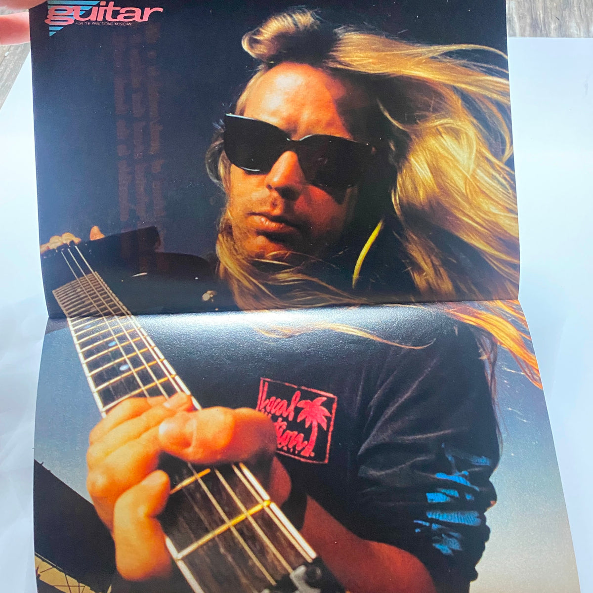 Fold-out poster in Guitar for the Practicing Musician Magazine June 1991 displaying a musician with long hair and sunglasses, reflecting the era's rock vibe.