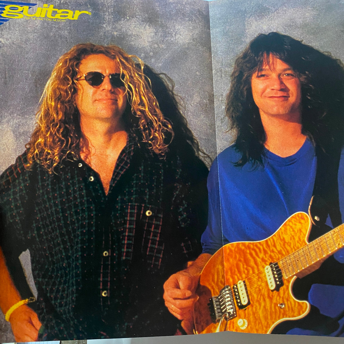 Spread from Guitar for the Practicing Musician Magazine August 1991 featuring two rock musicians, one holding an orange guitar, capturing the essence of 1990s rock music.