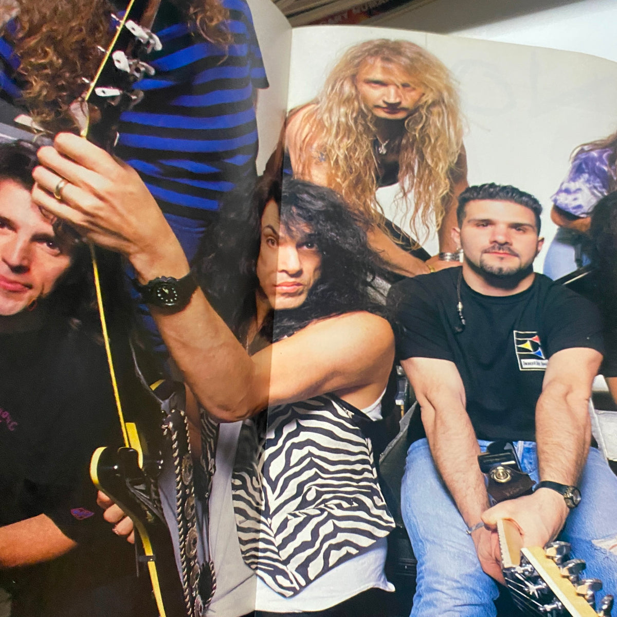 Image showcasing musicians from Guitar for the Practicing Musician Magazine August 1993, featuring members and guitars, including Anthrax and Kiss.