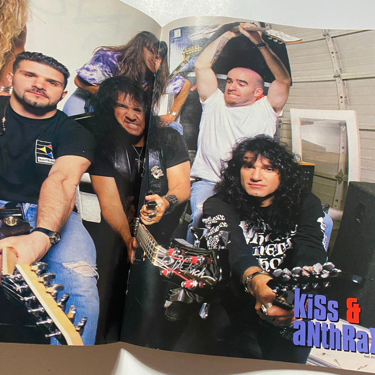 Image of musicians with guitars, including members of Anthrax and Kiss, from Guitar for the Practicing Musician Magazine August 1993.