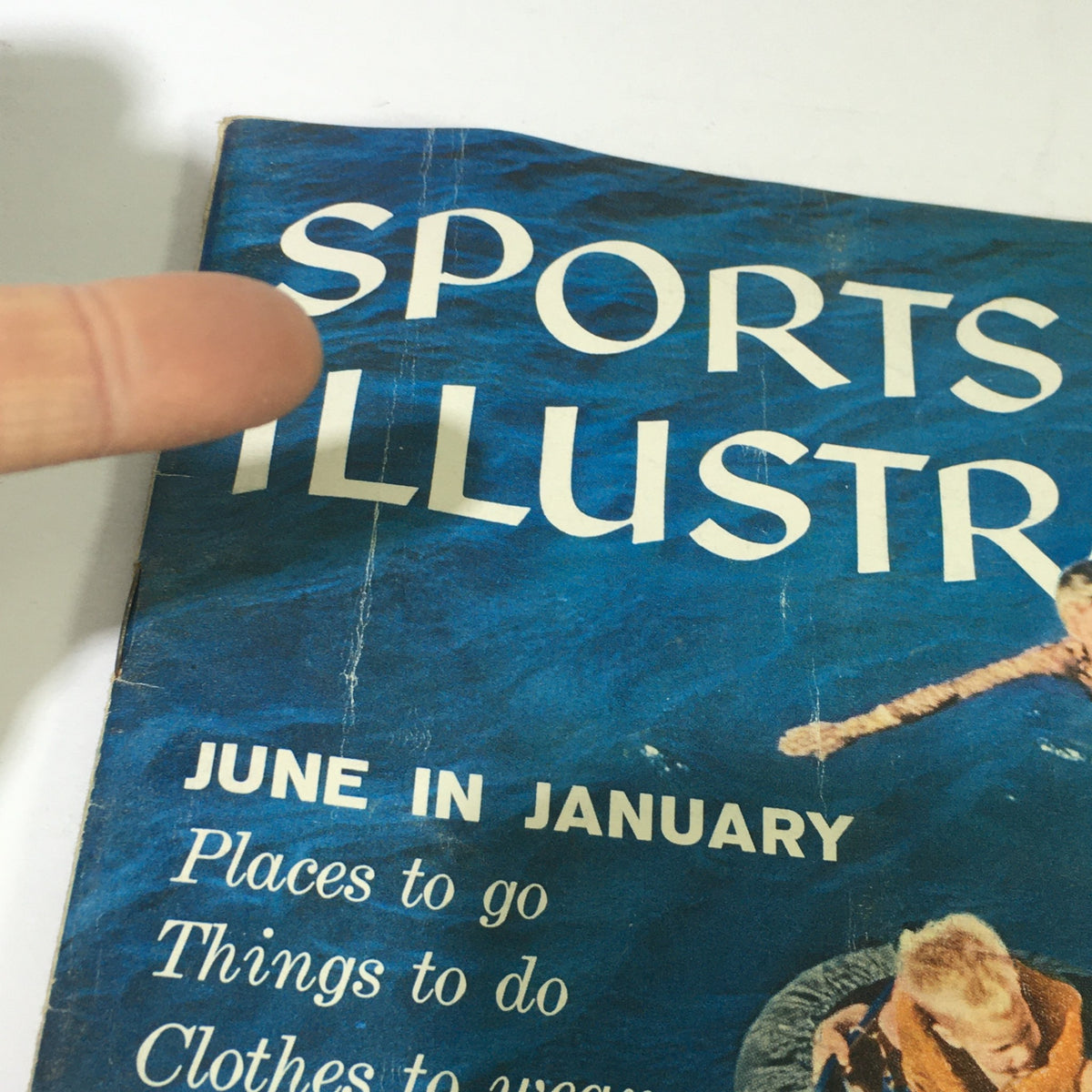 Close-up of the Sports Illustrated Magazine cover from January 6, 1958, highlighting the title and theme 'Family Fun in Nassau'.