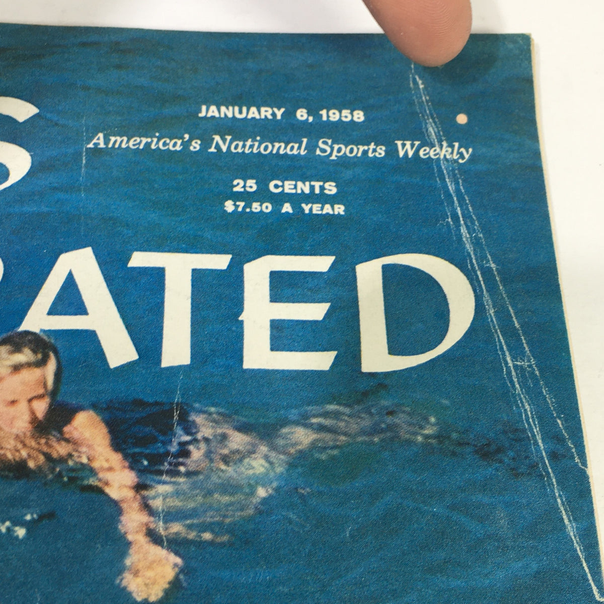 Cover of the VTG Sports Illustrated Magazine from January 6, 1958, showcasing a woman swimming in a pool, with the headline 'Sports Illustrated' and details about pricing and publication.