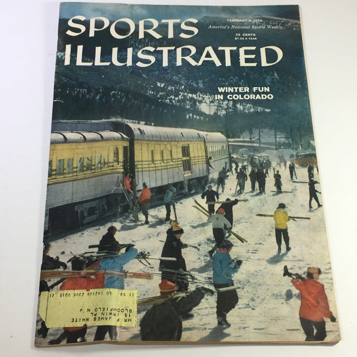 Cover of the VTG Sports Illustrated Magazine from February 9, 1959, depicting winter fun in Colorado with skiers and a train in a snowy landscape.