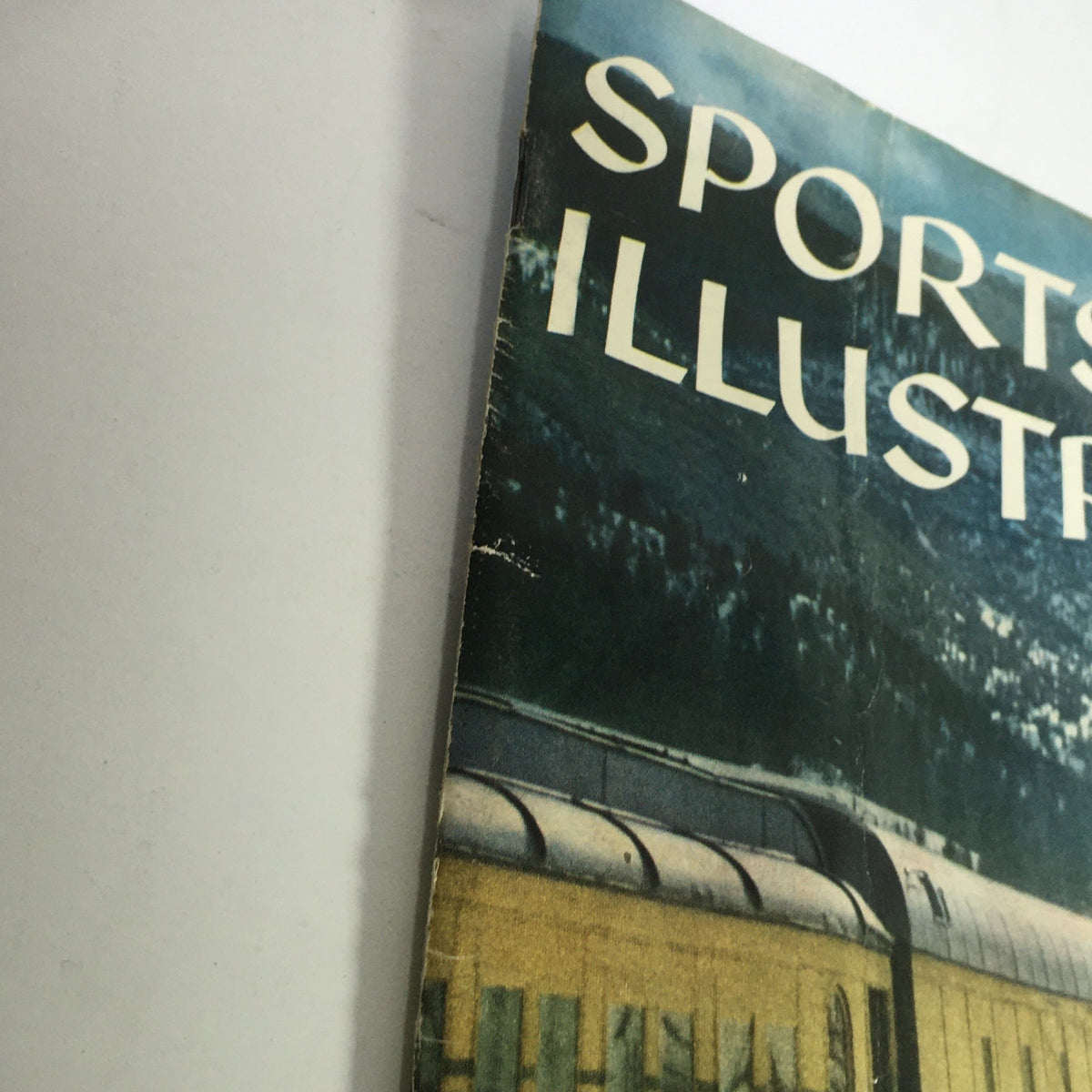 Side view of the VTG Sports Illustrated Magazine February 9, 1959, showing the title and cover design focused on winter sports in Colorado.