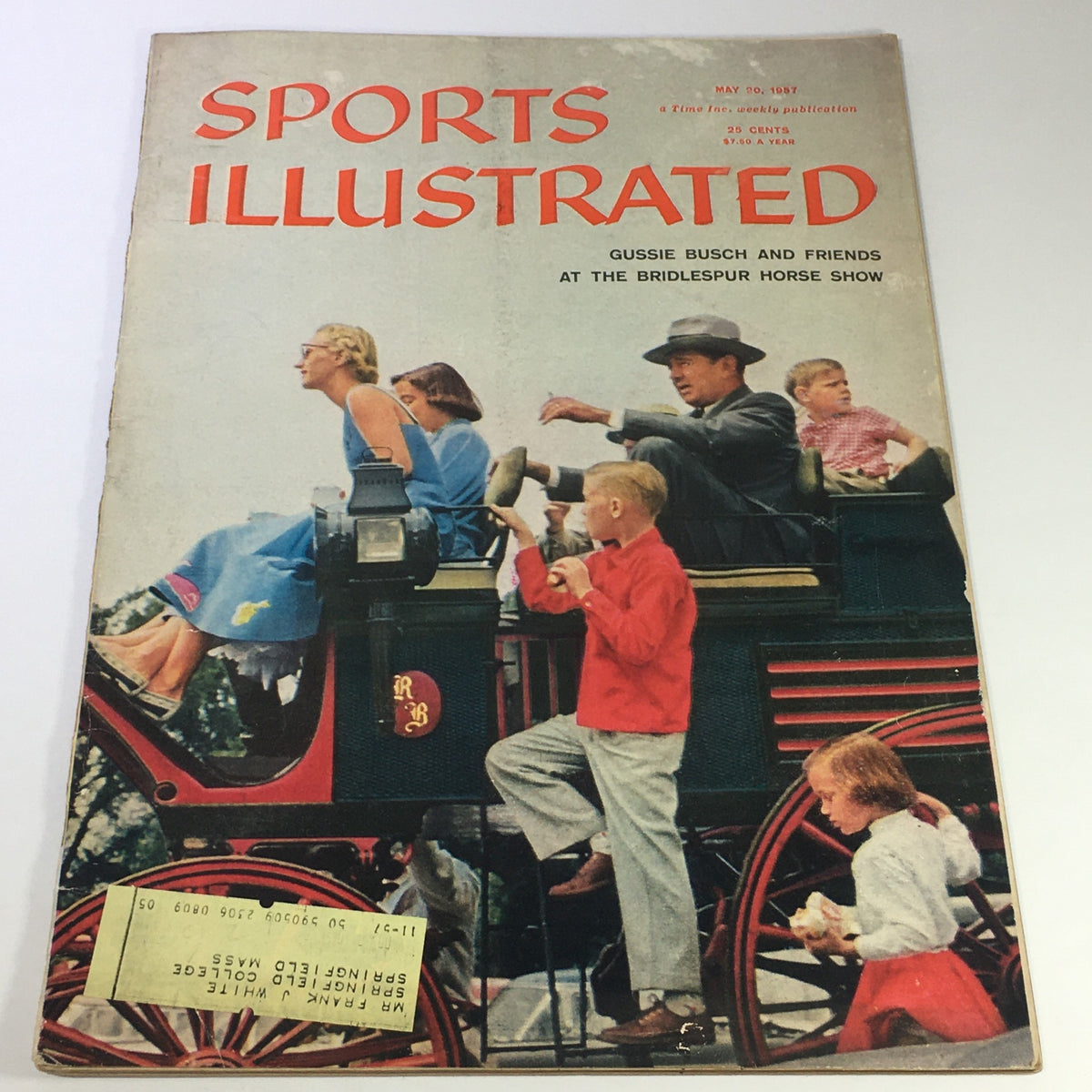 Vintage Sports Illustrated Magazine from May 20, 1957 featuring Gussie Busch and friends at the Bridlespur Horse Show, showcasing a nostalgic cover with children and adults in period attire.