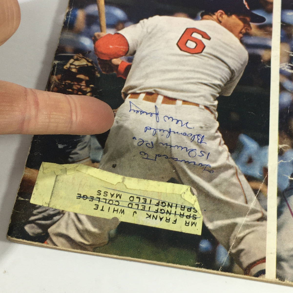 Detailed view of the back cover of Sports Illustrated Magazine from July 8, 1957, showing player number 6, annotations, and vintage marking, emphasizing the collectible features.