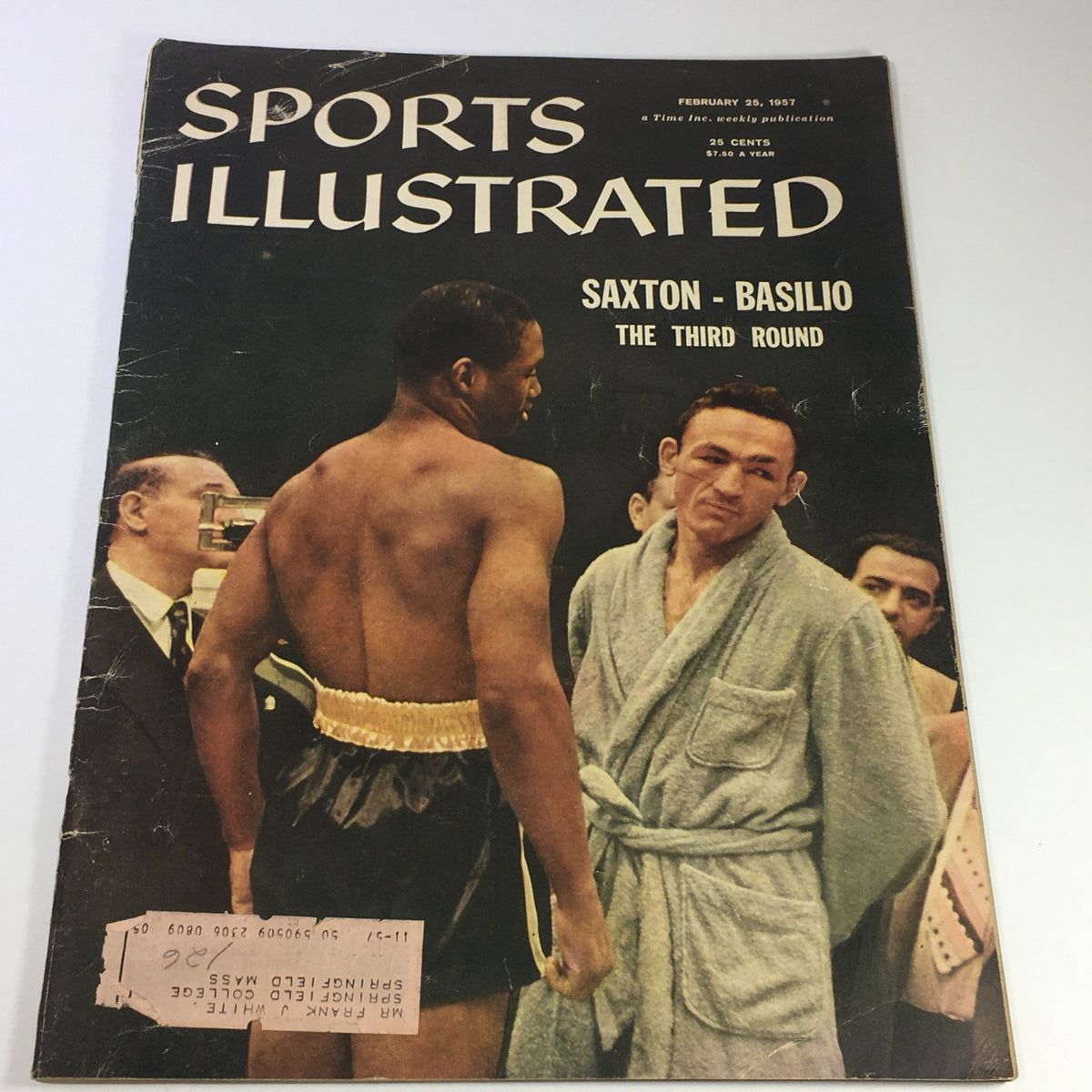 Cover of the VTG Sports Illustrated Magazine February 25, 1957 featuring the boxing match between Johnny Saxton and Carmen Basilio, showcasing the fighters and the magazine's title.