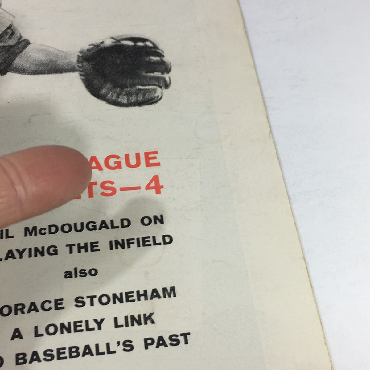 Close-up of the text from the 'VTG Sports Illustrated Magazine May 5 1958' cover, featuring key stories about Gil McDougald and Horace Stoneham.