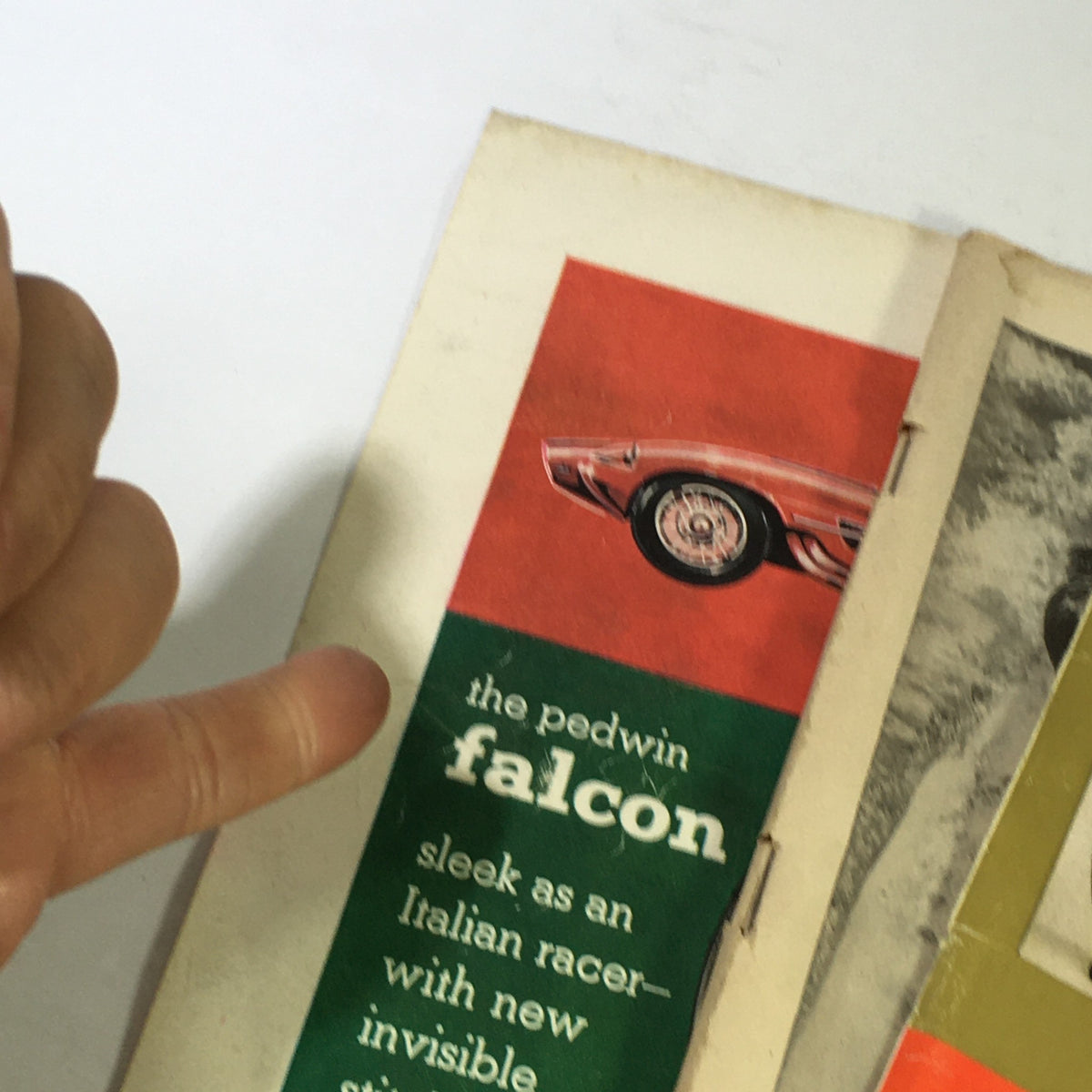 Inside view of the VTG Sports Illustrated Magazine from December 23, 1957, showcasing advertisements and articles related to vintage cars and sports themes.