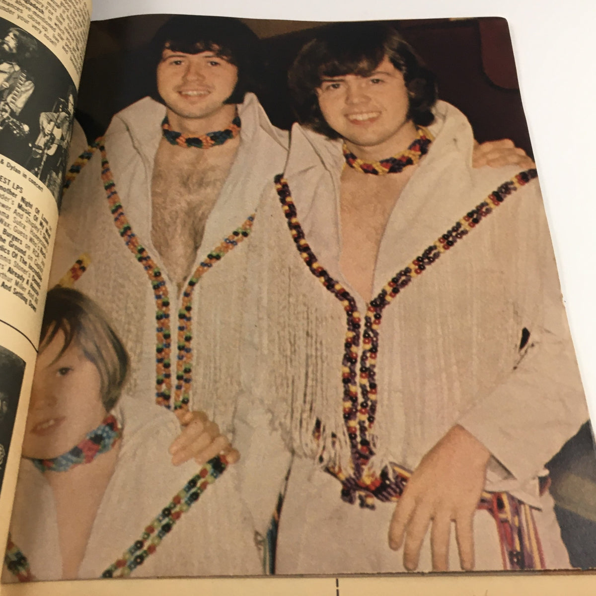 16 Magazine July 1972 featuring David Cassidy, The Osmonds, and Bobby Sherman, image of two men in fringed outfits with colorful beaded accessories.