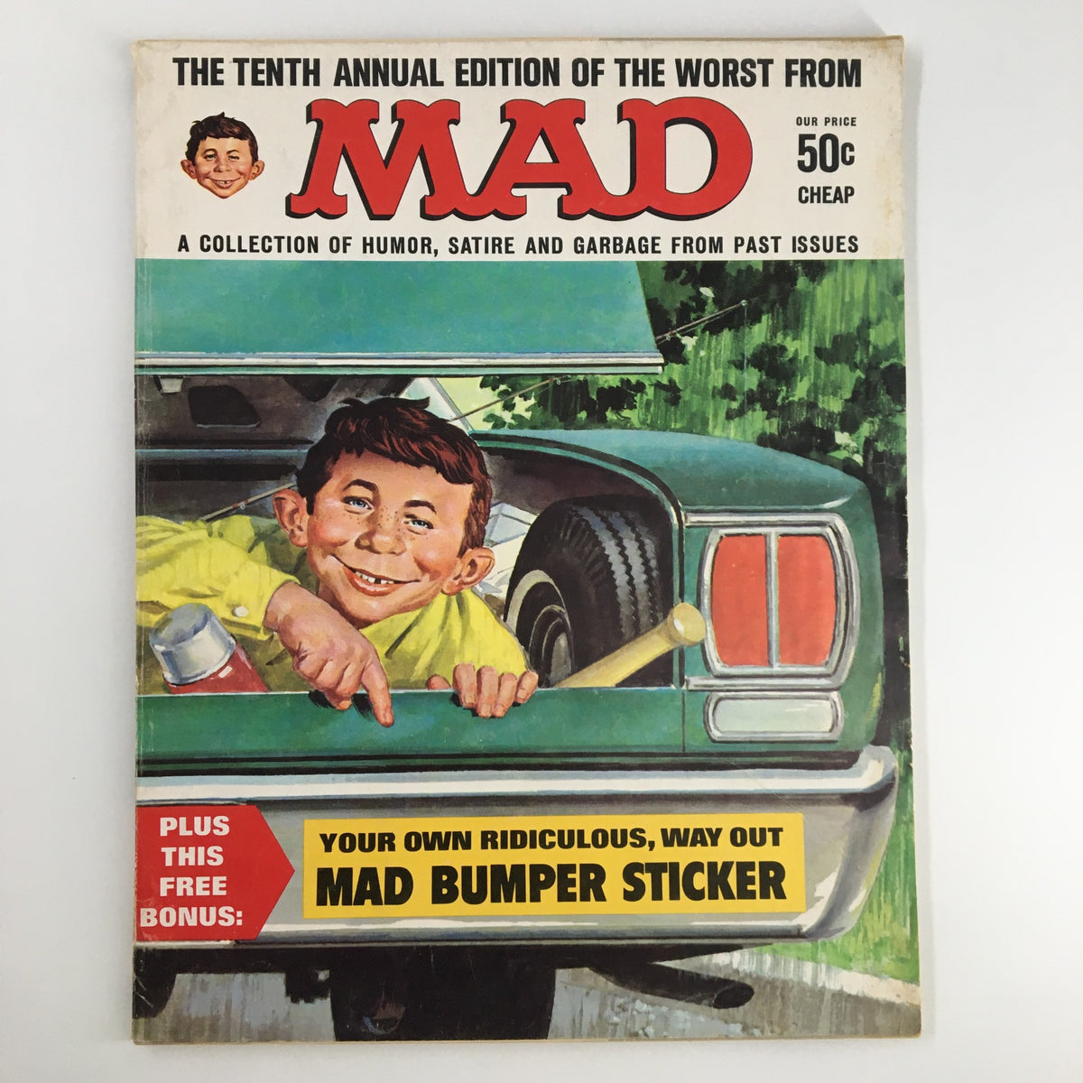 Cover of Mad Magazine 1967 The Tenth Annual Edition of Worst from Mad, featuring a smiling boy with brown hair in a car, highlighting humor and satire.