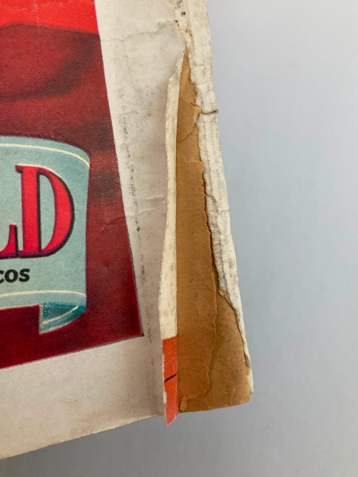 Close-up of the spine damage on the VTG Redbook Magazine October 1947, showing signs of age and wear.