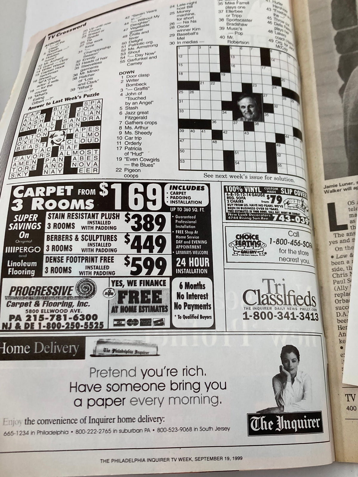 Inside page of The Philadelphia Inquirer TV Week September 19, 1999 featuring a TV crossword puzzle and advertisements, offering a glimpse into late 90s television culture.