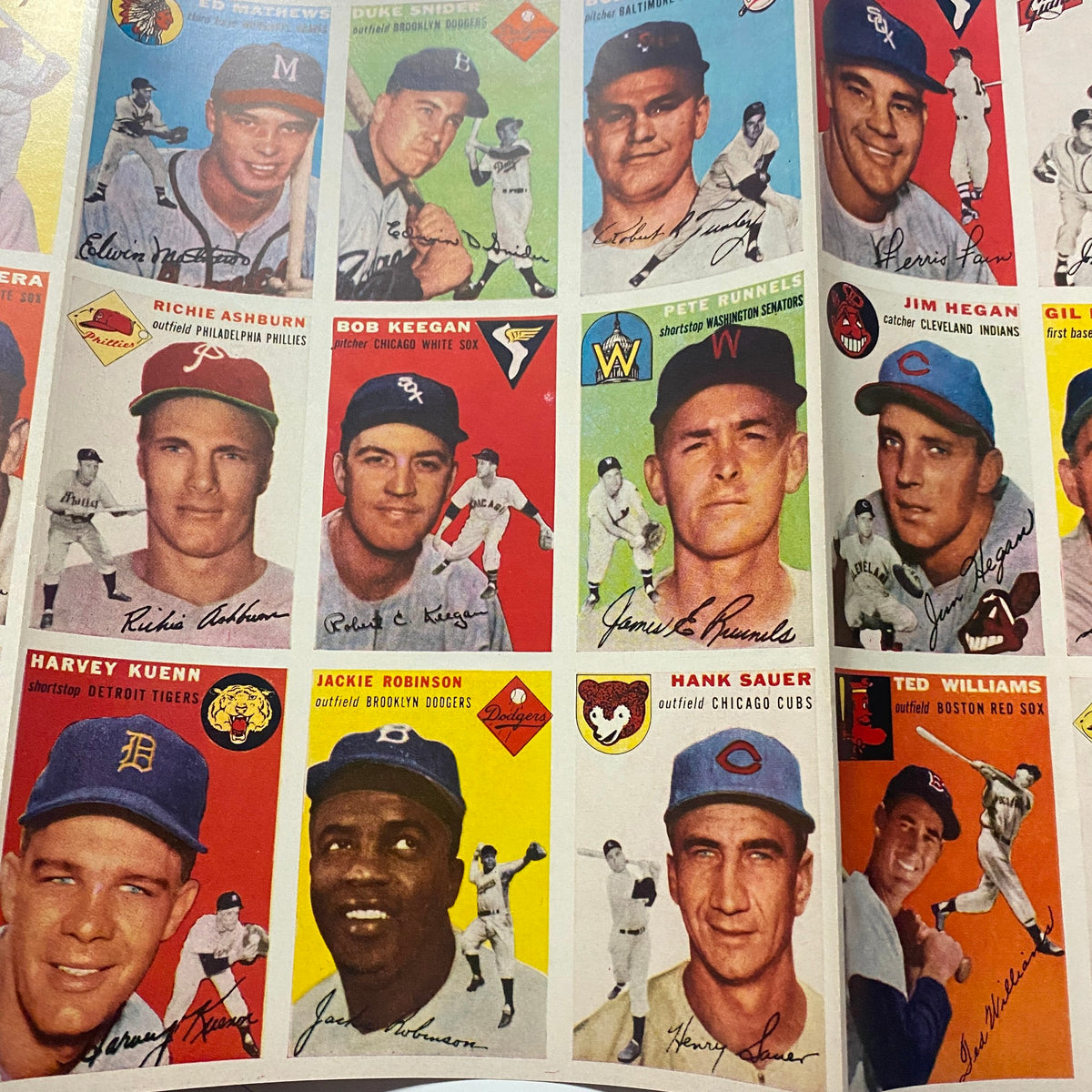 Sports Illustrated Magazine August 16 1954 featuring a page of vintage baseball player cards, highlighting icons like Jackie Robinson and Ted Williams in the premier issue.