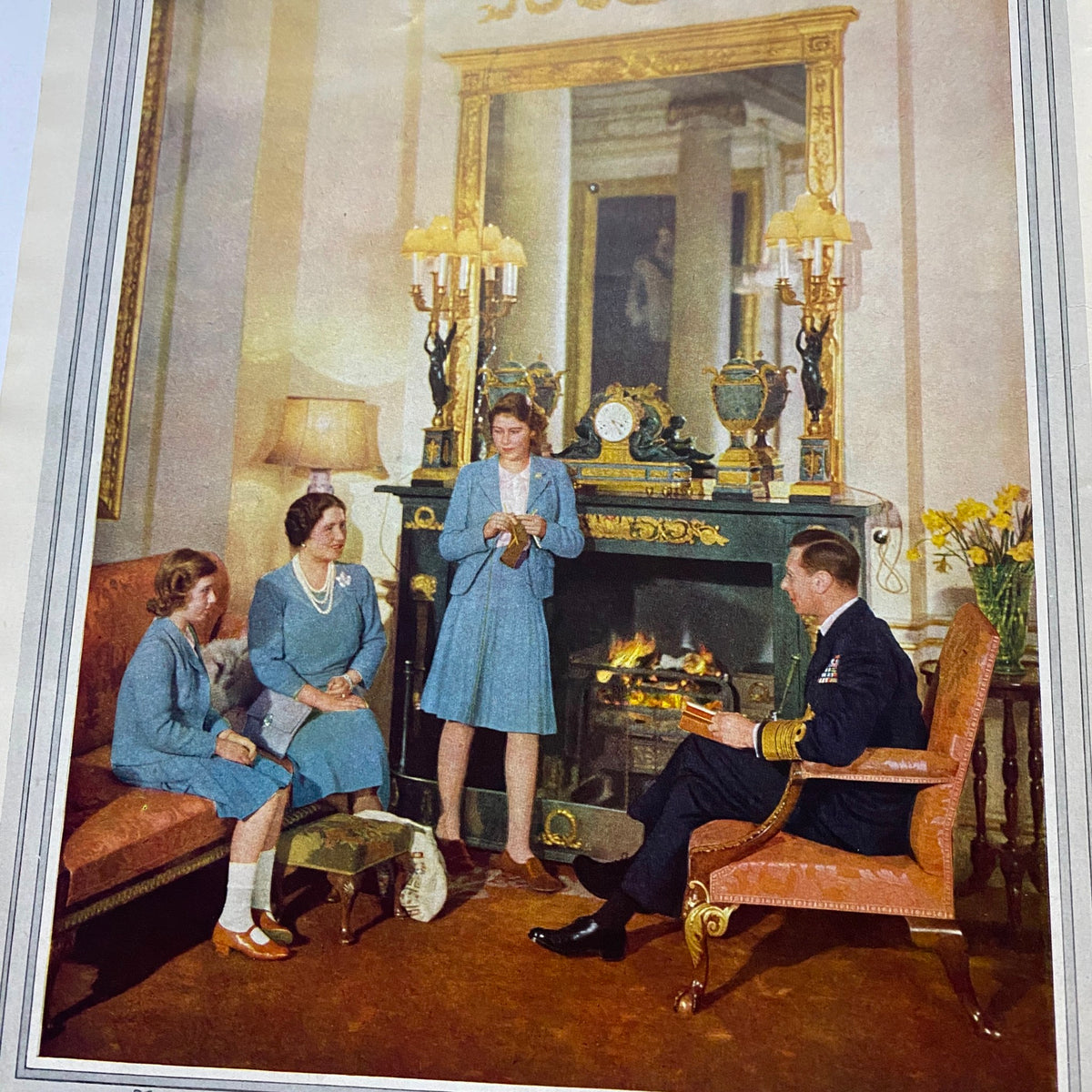The Illustrated London News May 1 1948 - Princess Elizabeth & Philip, featuring a family moment with royal figures in a beautifully decorated room by a fireplace.