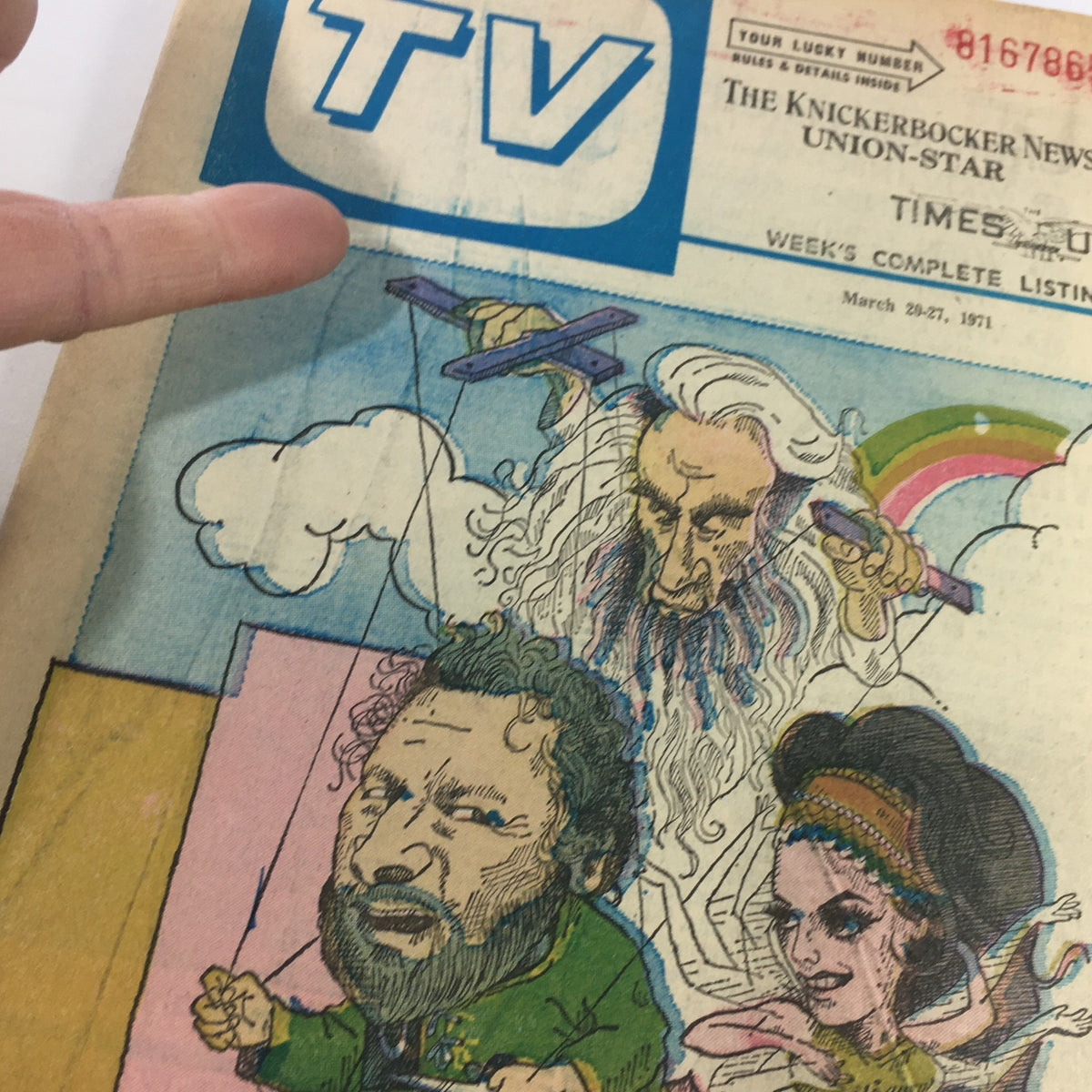 Close-up of Vintage TV Week magazine cover from March 20-27, 1971, highlighting the title 'VTG TV Week's Complete TV Listings March 20-27 1971 - Gideon Hall of Fame' with detailed cartoon artwork and figures in the background.