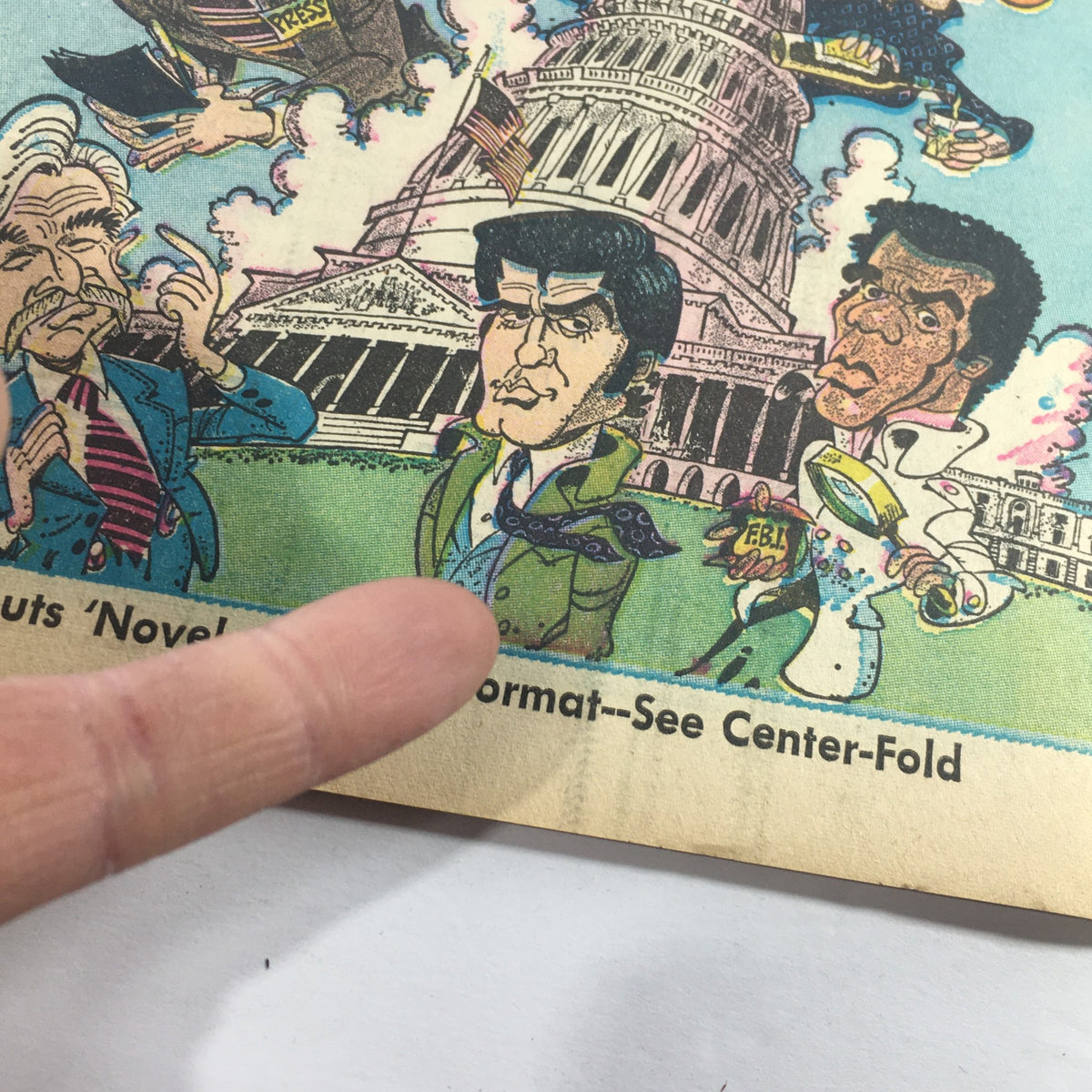 Close-up view of the cover of 'VTG TV Week's Complete TV Listings March 6-13 1971' showcasing cartoon figures and the caption 'NBC Debuts Novels Into TV Format--See Center-Fold'.