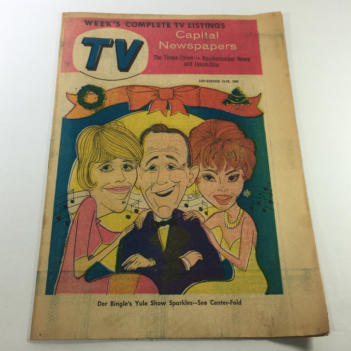 VTG TV Week's Complete TV Listings December 13-20 1969 cover featuring cartoon illustrations of a cheerful man in a tuxedo surrounded by two glamorous women, promoting Der Bingle's Yule Show.