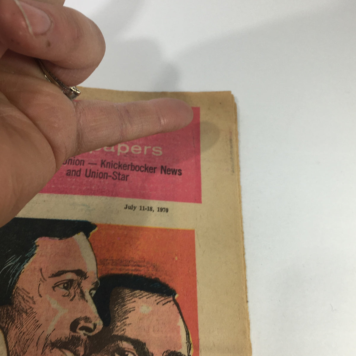 Close-up image of the top section of VTG TV Week's Complete TV Listings July 11-18 1970, displaying details from the publication with focus on the date and newspaper names.