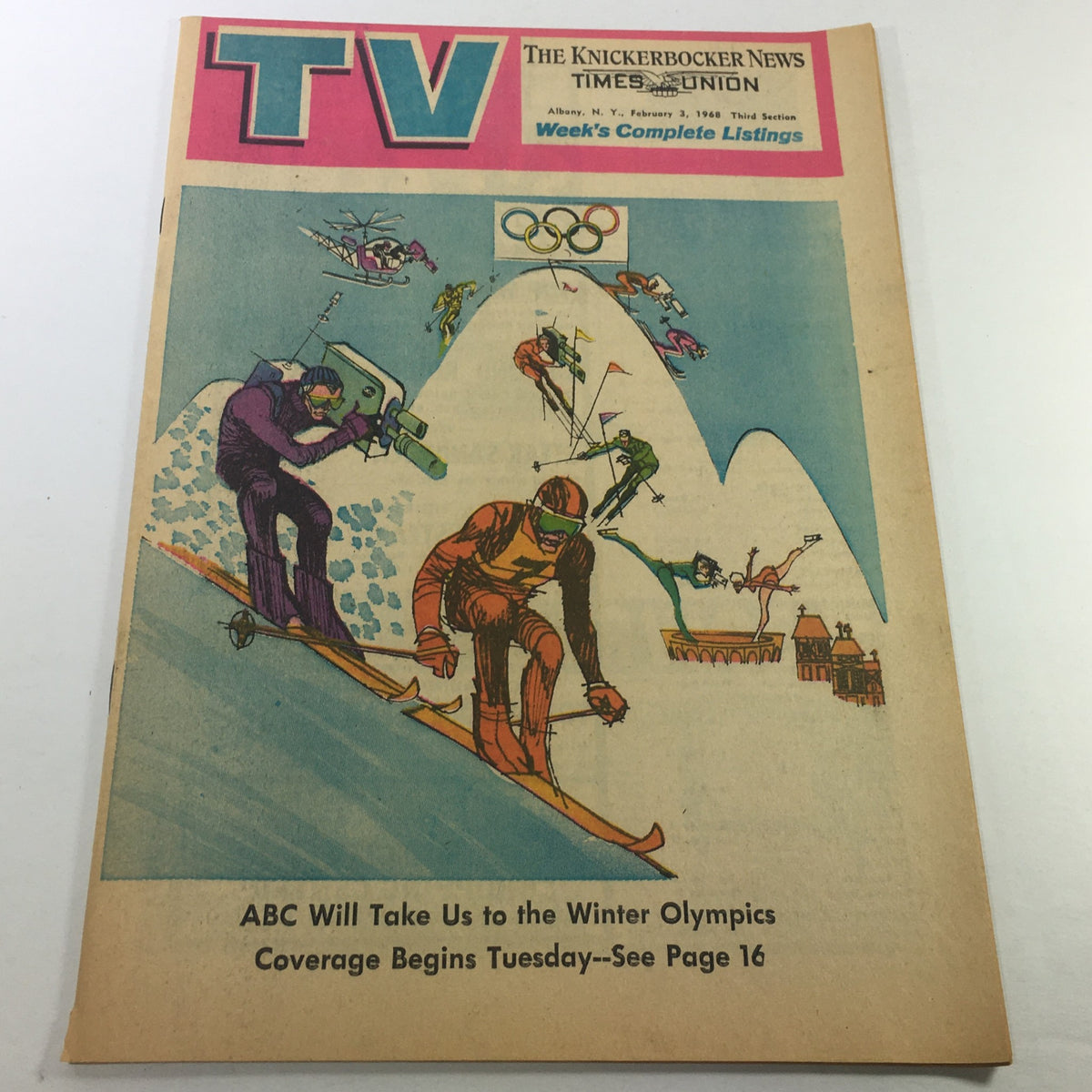 Cover of VTG TV Week's Complete TV Listings February 3 1968 featuring Winter Olympics coverage, showcasing vibrant illustrations of skiers and Olympic rings.