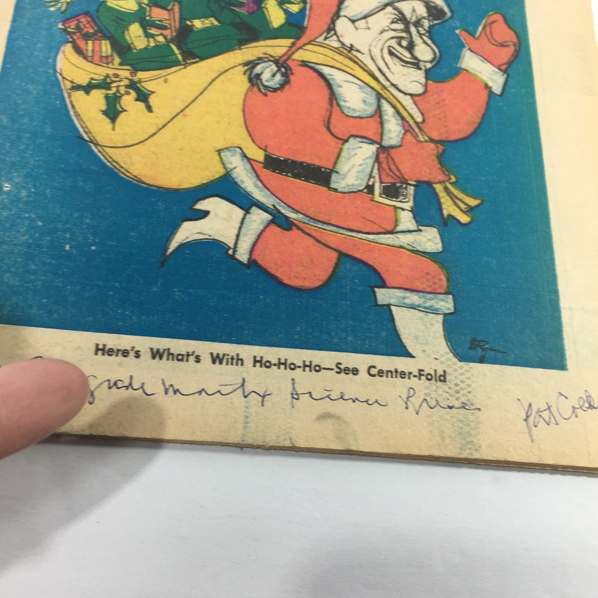 Detail of the bottom section of the VTG TV Week's Complete TV Listings December 20-27 1969 - Santa Claus Ho-Ho-Ho cover highlighting a playful Santa and the text 'Here's What's With Ho-Ho-Ho - See Center-Fold'.