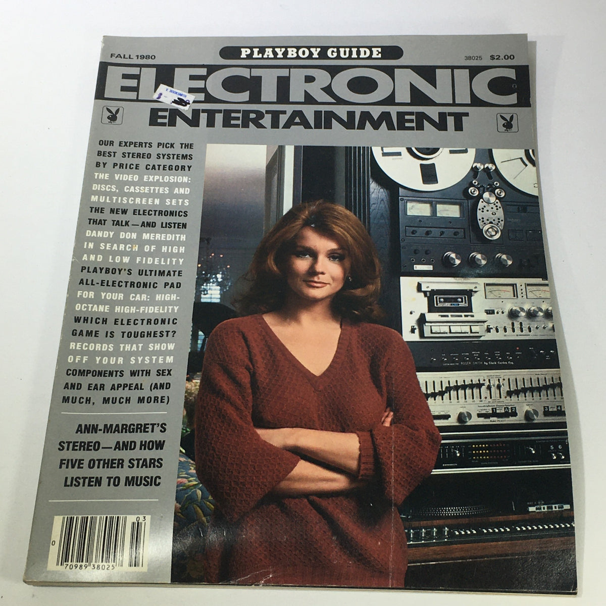 Vintage Playboy Guide Electronic Entertainment Fall 1980 cover featuring a woman in a brown sweater, standing in front of audio equipment, highlighting stereo systems and music technology.