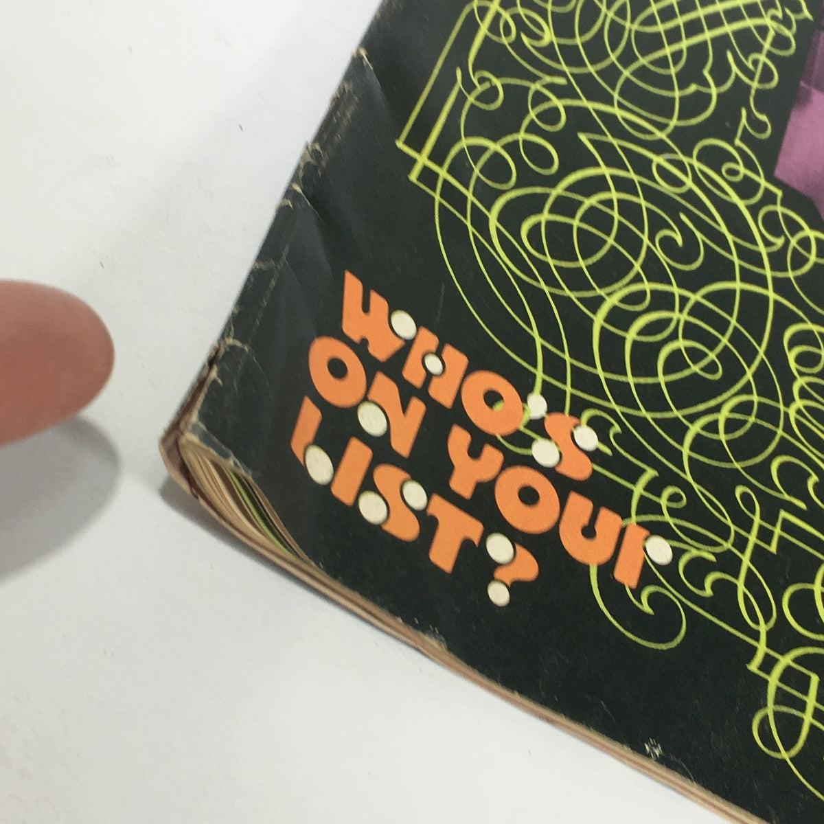 Close-up of the spine of VTG Down Beat Magazine August 16 1973 showcasing the text 'Who's on your list?' and the vintage magazine's aged condition.