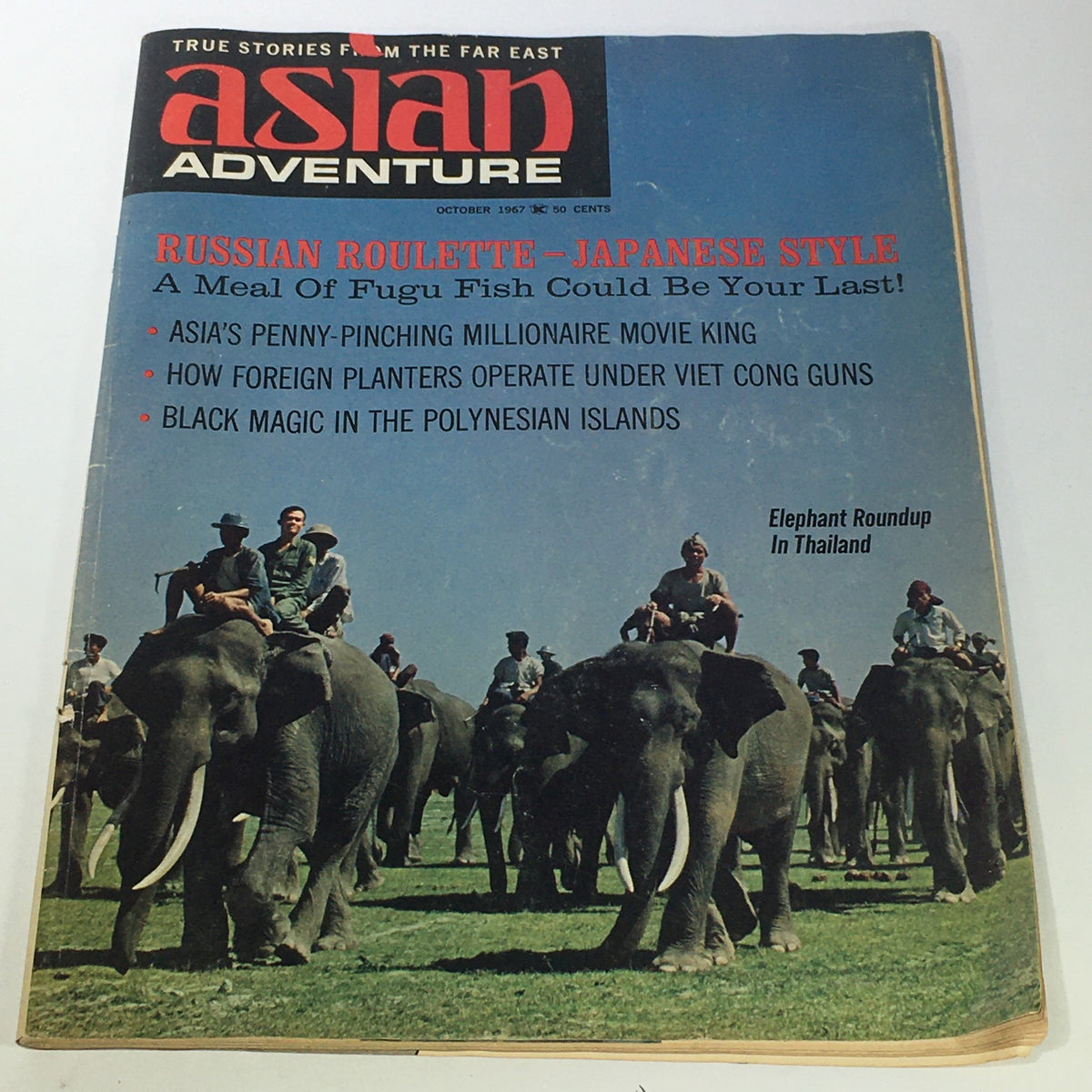 Cover of VTG Asian Adventure Magazine October 1967 featuring an Elephant Roundup in Thailand with elephants and riders in a scenic landscape.