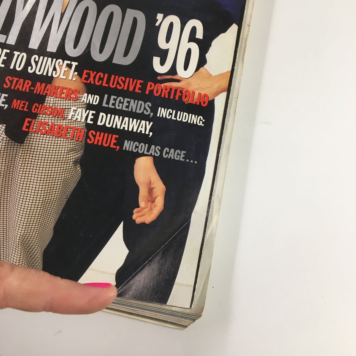 Cover detail of Vanity Fair Magazine April 1996, featuring hands and vibrant text highlighting a Hollywood portfolio.