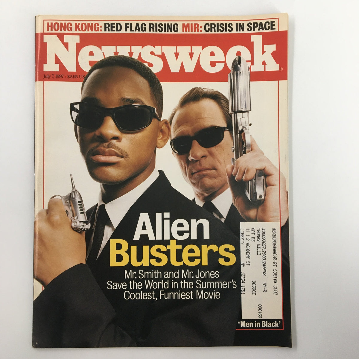 Cover of Newsweek Magazine July 7, 1997 featuring Will Smith and Tommy Lee Jones as Alien Busters, promoting their movie 'Men in Black' with a striking image and bold text.