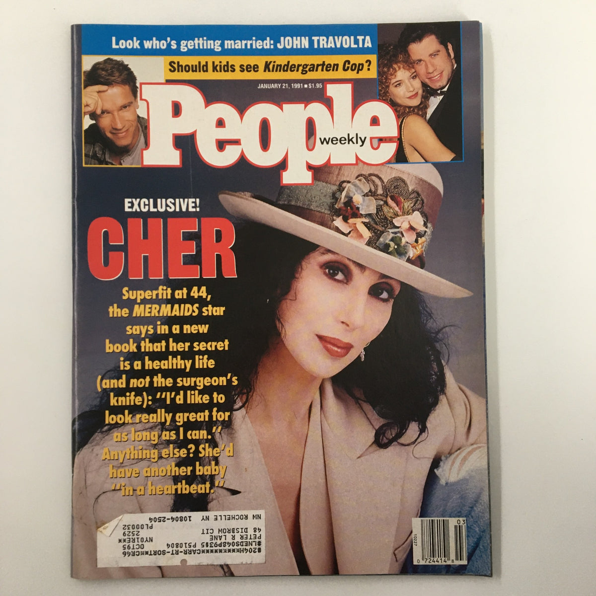 Cover of People Weekly Magazine, January 21, 1991 featuring Cher, John Travolta, and Arnold Schwarzenegger. Highlights include Cher's exclusive interview and images of celebrities from the early '90s.