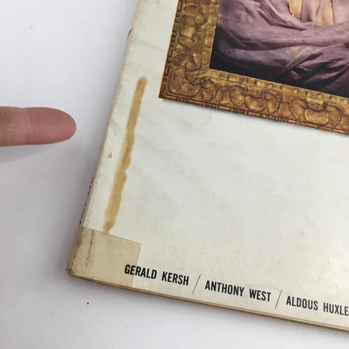 Close-up of the side of Esquire Magazine May 1956 showing minor wear and details including the contributors' names: Gerald Kersh, Anthony West, and Aldous Huxley.