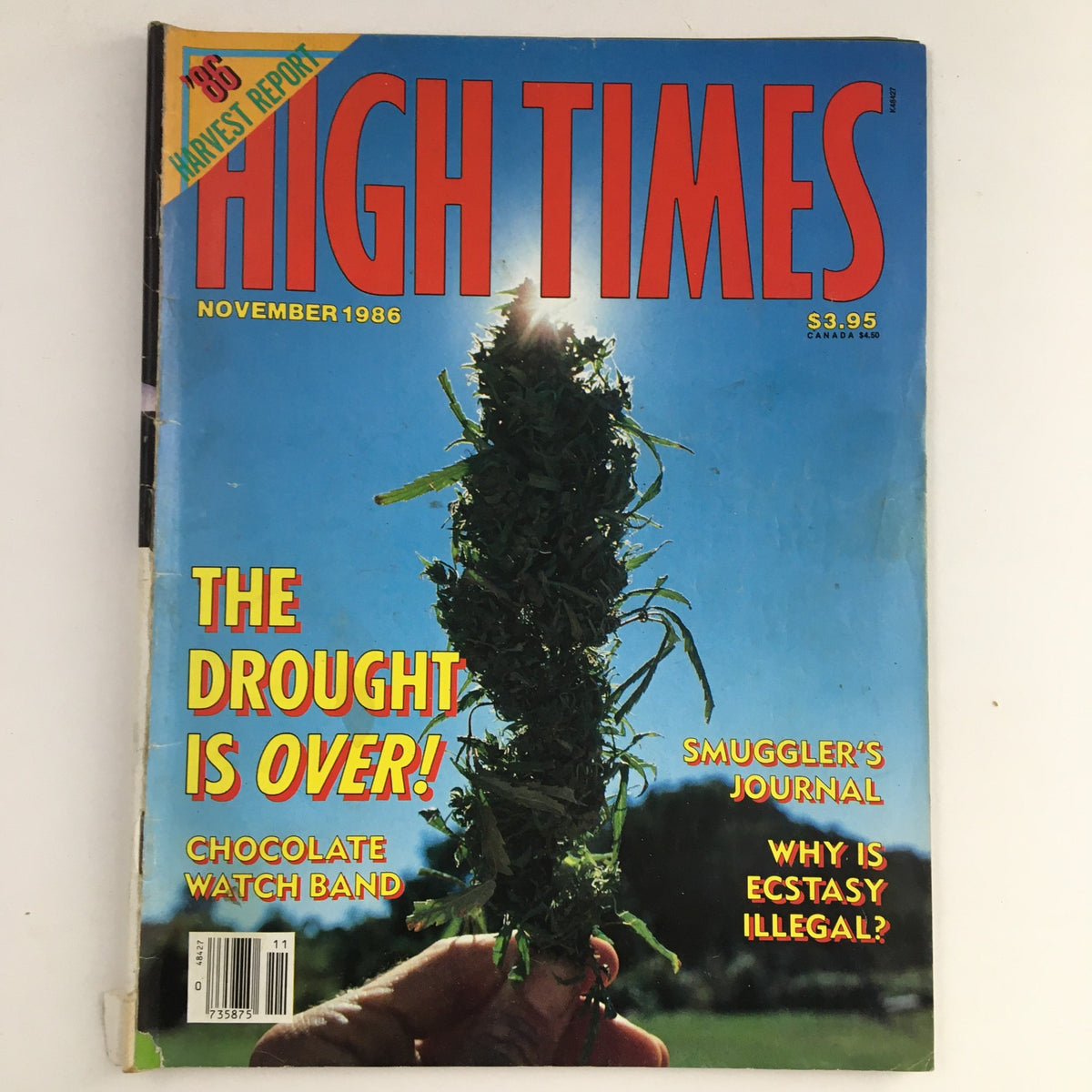 Cover of High Times Magazine November 1986 featuring the headline 'THE DROUGHT IS OVER!' and an image of a hand holding a cannabis plant.