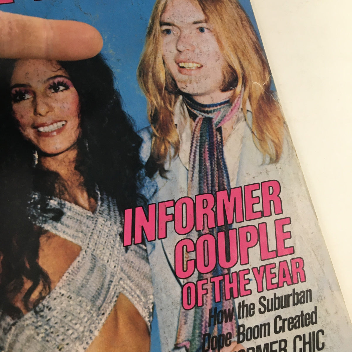 Close-up view of High Times Magazine January 1978 cover, showcasing the headline 'Informer Couple of the Year' alongside Cher and another individual.