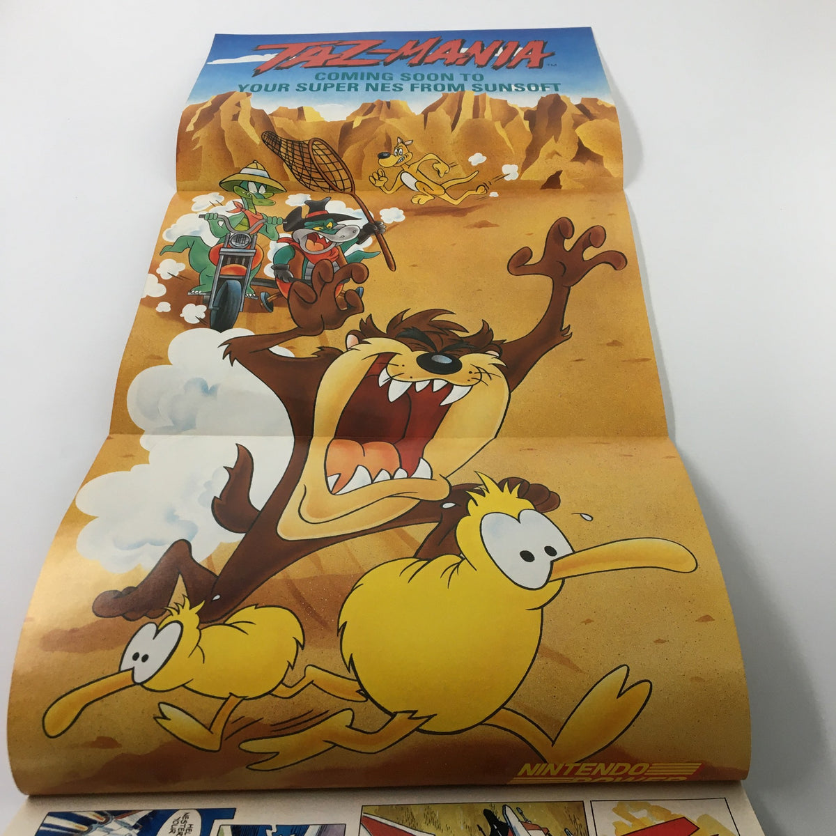 Collectible poster from Nintendo Power Magazine March 1993 #46 promoting the upcoming game Taj Mania with vibrant cartoon characters.
