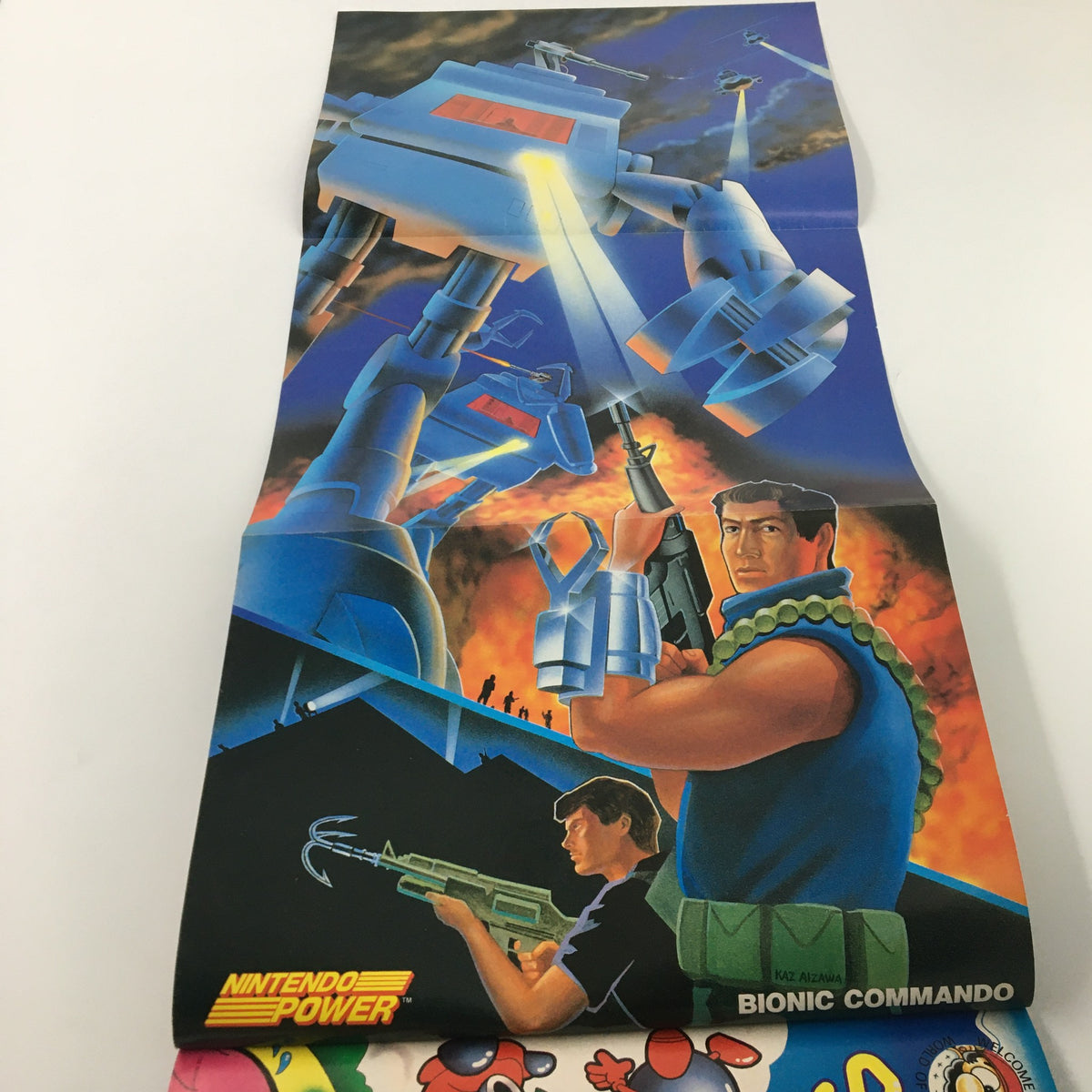 Poster from the Nintendo Power Magazine September 1988 featuring artwork for Bionic Commando, an iconic game of the era.