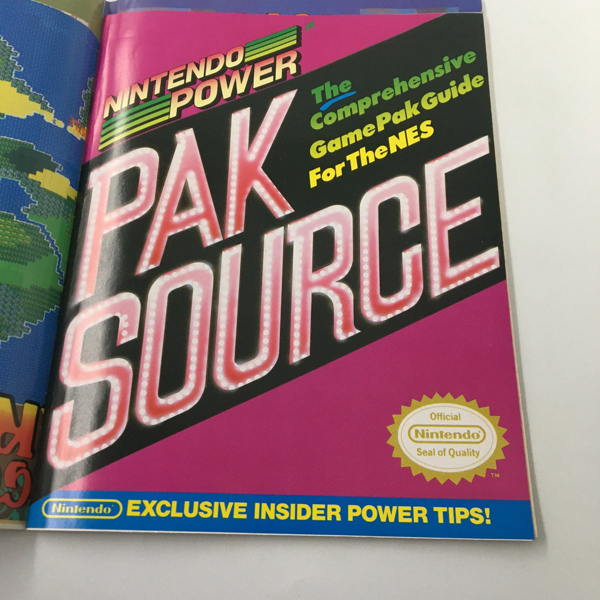 The vibrant cover page of the Nintendo Power Magazine March 1990, titled 'Pak Source', emphasizing insider tips and guides for NES video games.