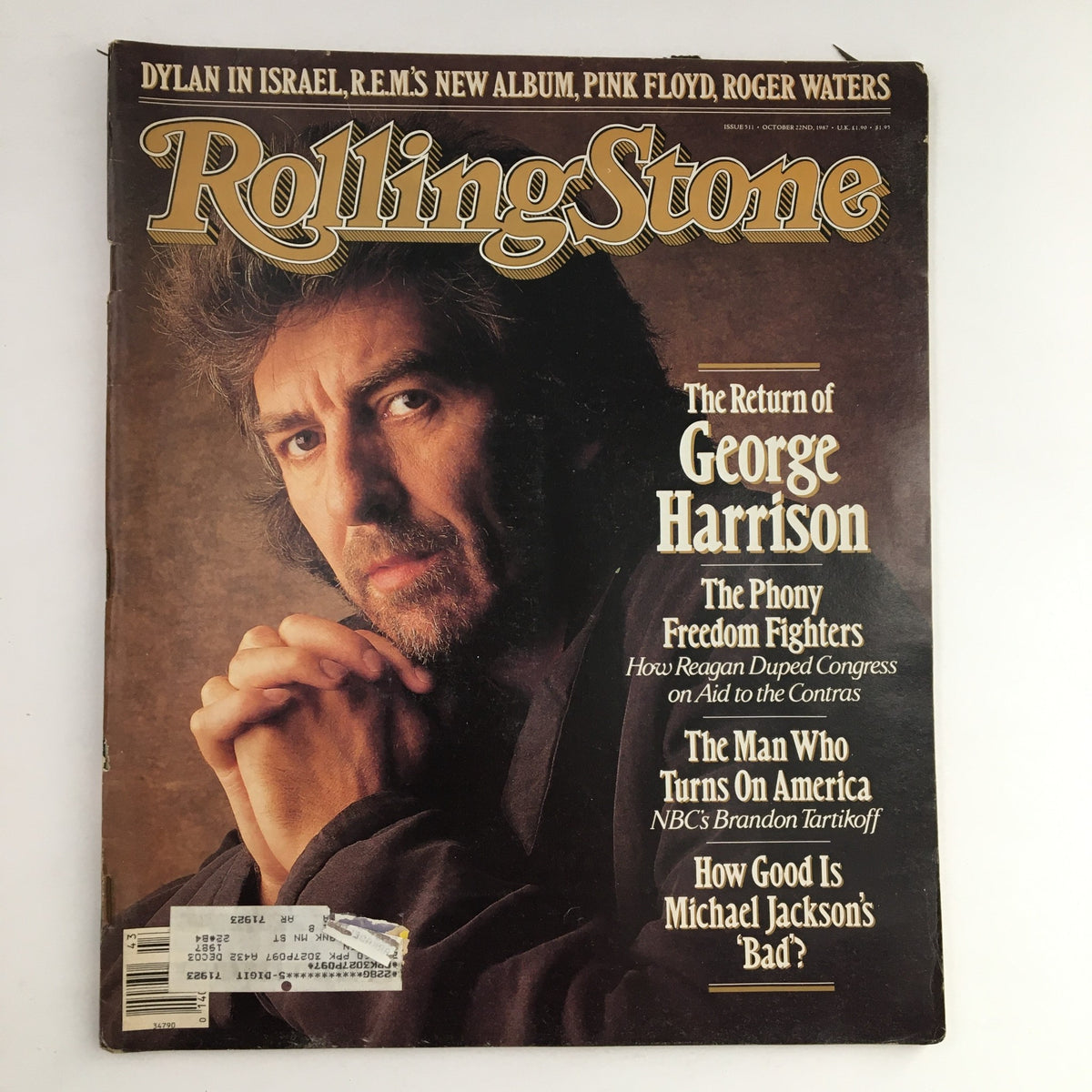Rolling Stone Magazine cover from October 22, 1987, featuring George Harrison on the front, with the title 'The Return of George Harrison.' The magazine also highlights articles about Bob Dylan and Michael Jackson's album 'Bad.'