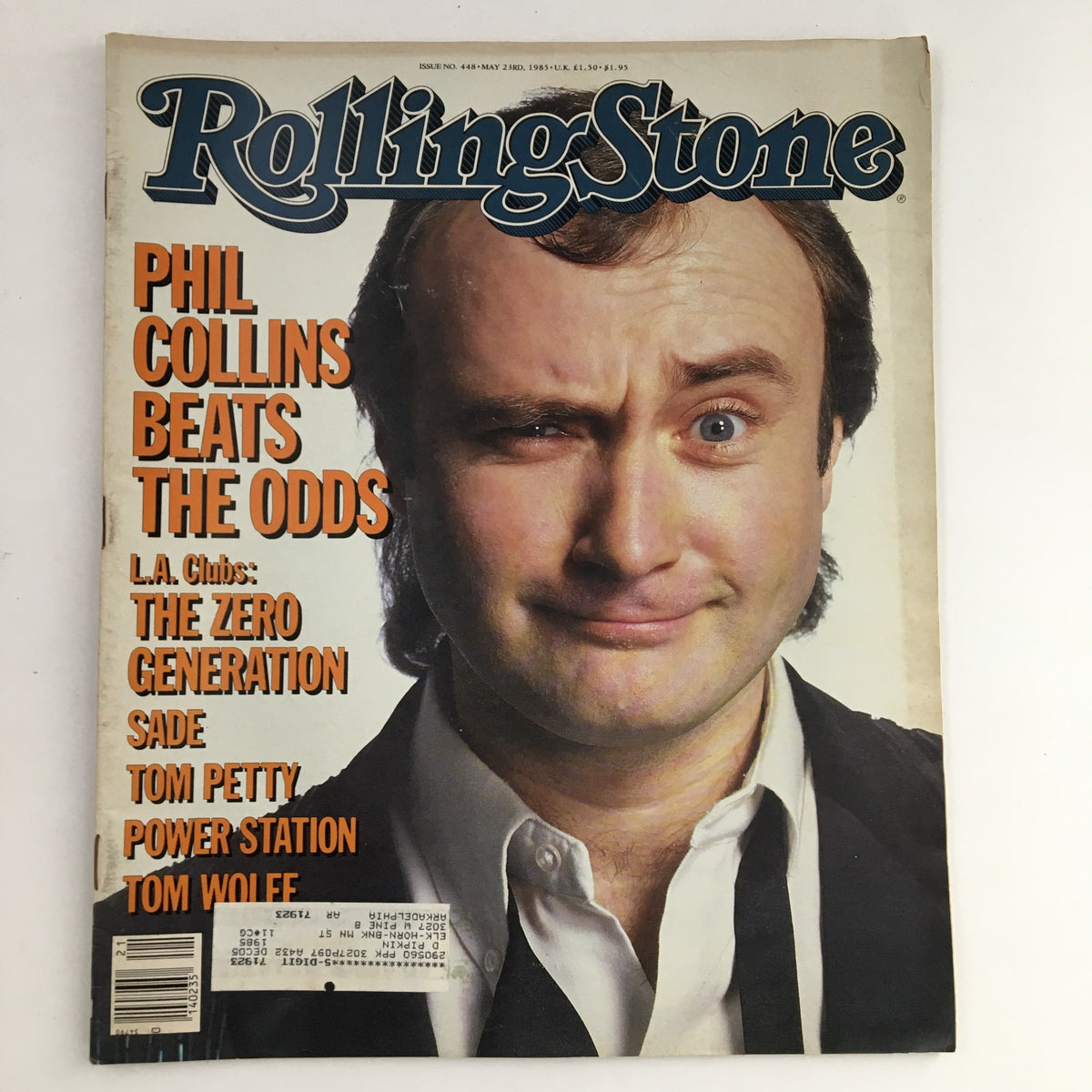 Cover of Rolling Stone Magazine dated May 23, 1985 featuring Phil Collins, Tom Petty, and Tom Wolfe with the headline 'Phil Collins Beats the Odds'.