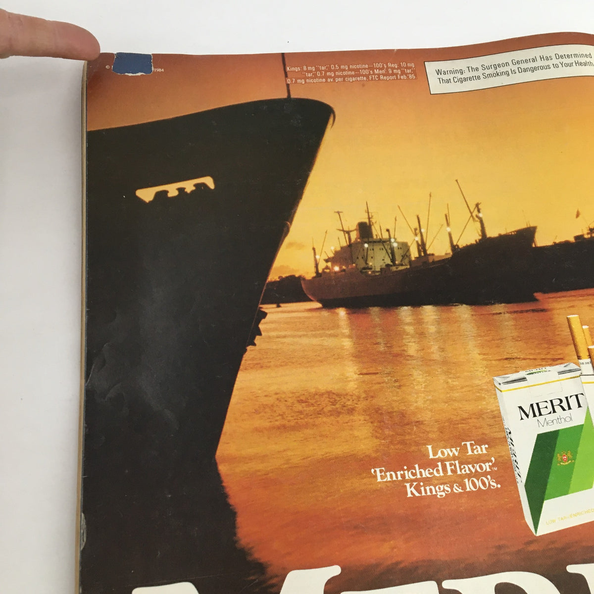 Cover image of Rolling Stone Magazine from July 4, 1985 featuring Clint Eastwood, Led Zeppelin, and Bob Dylan. The magazine has visible wear, with details of a cigarette advertisement for Merit Menthol in a sunset backdrop over a harbor.