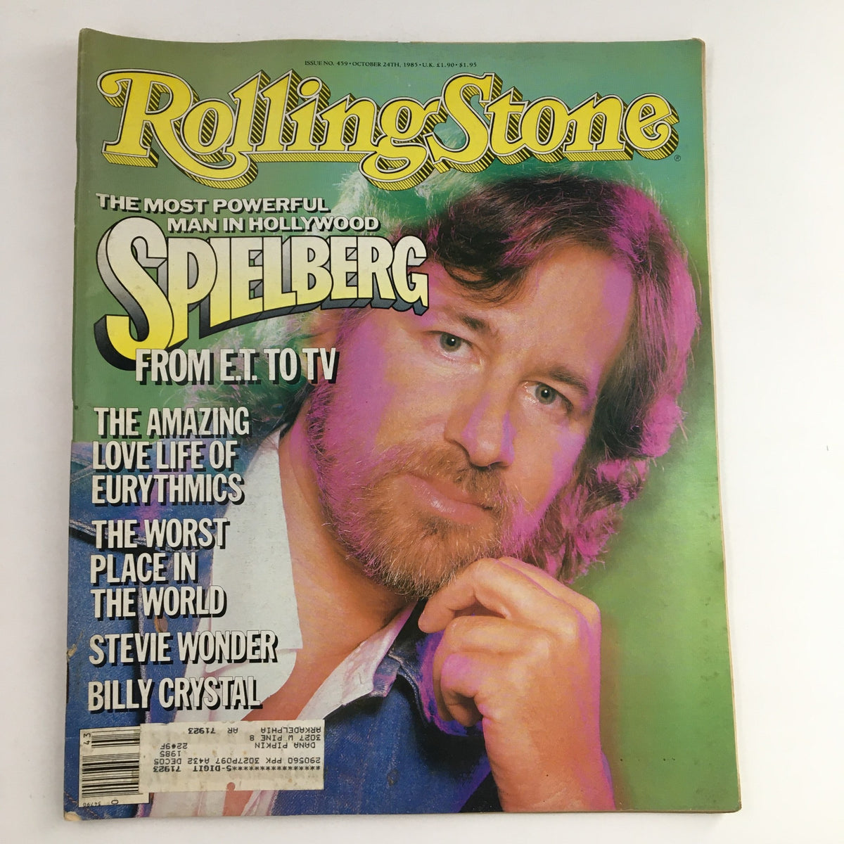 Rolling Stone Magazine, October 24, 1985 featuring an article on Steven Spielberg titled 'The Most Powerful Man in Hollywood.' The cover includes headlines about Stevie Wonder and Billy Crystal, showcasing vibrant colors and imagery.